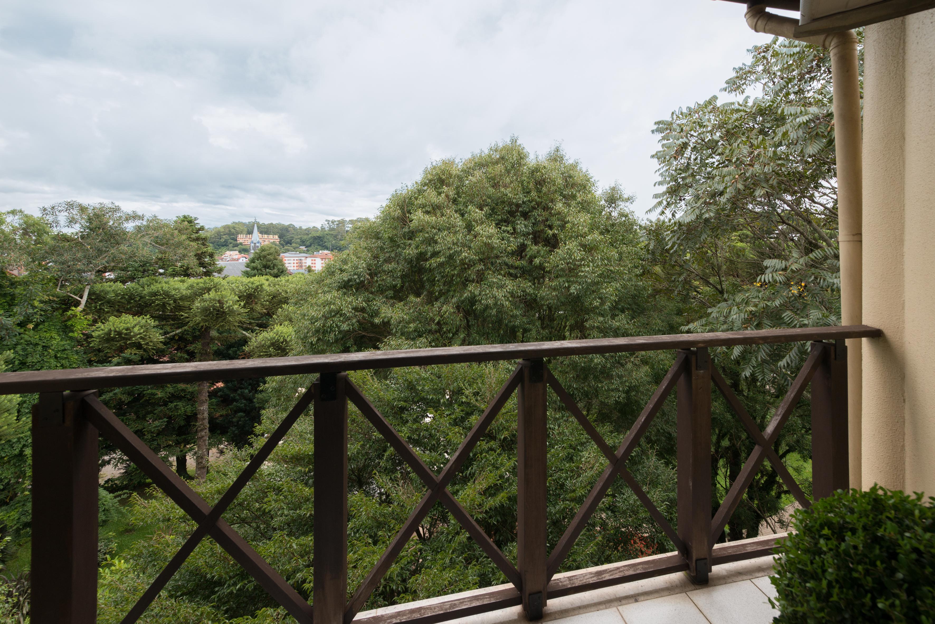 Wish Serrano Resort Gramado Bagian luar foto A view of the park from the house